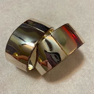 2 silvery wide bangle bracelets